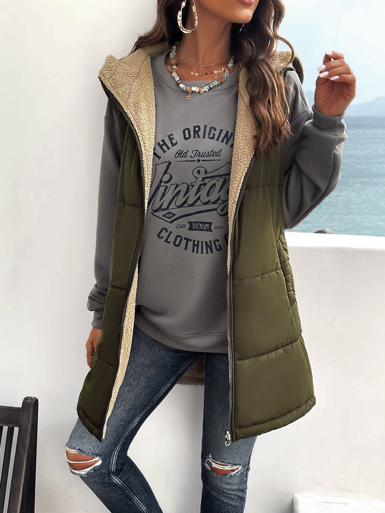 Elegant Puffer Vest with Hood and Sherpa Lining for Cozy Outings